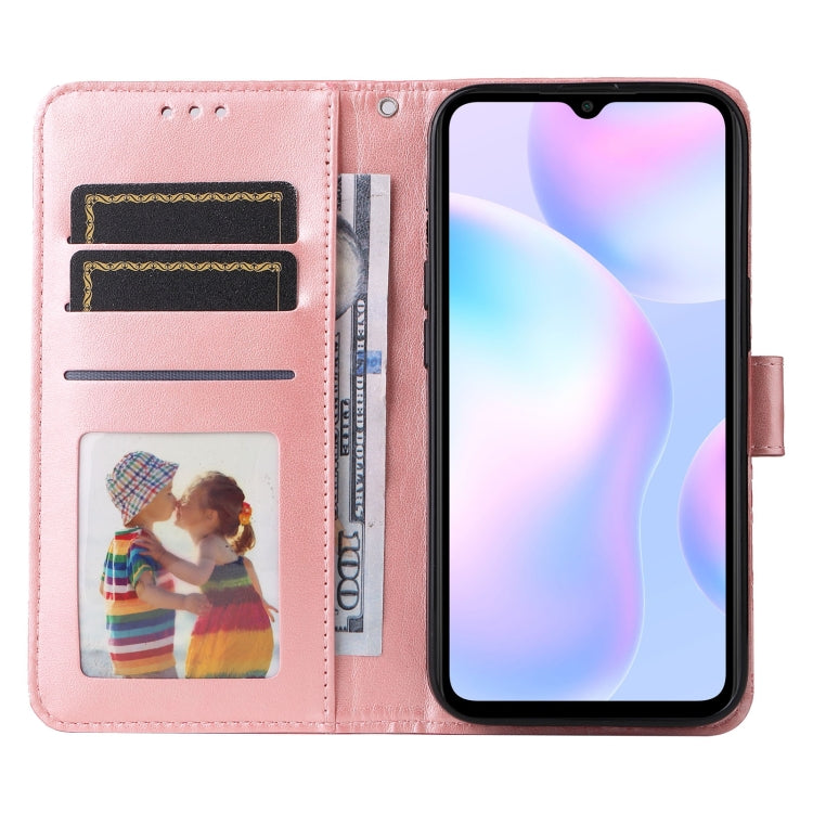 Pink flip phone case with card slots, window pocket, and embossed sunflower design