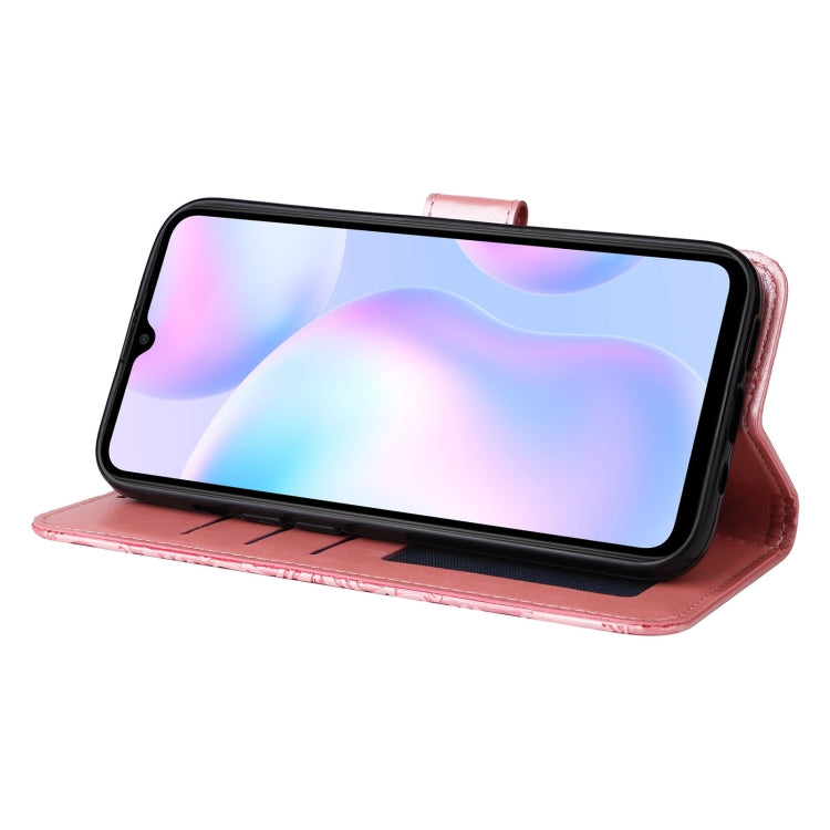 Pink embossed sunflower flip phone case used as a stand for landscape viewing