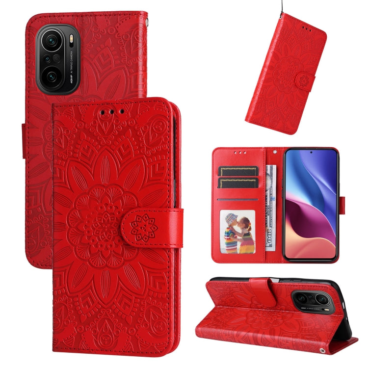 Red embossed sunflower leather phone case with card slots and magnetic closure