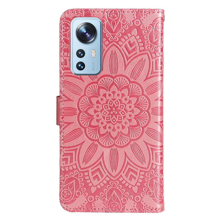 Pink embossed sunflower leather phone case with cutouts for camera and buttons
