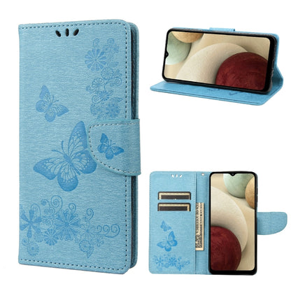 Light blue embossed butterfly flip leather phone case with side card slots and stand view