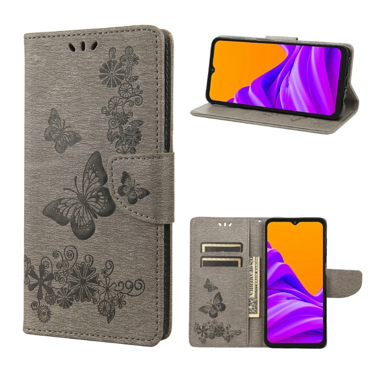 Grey embossed butterfly flip phone case with magnetic side strap