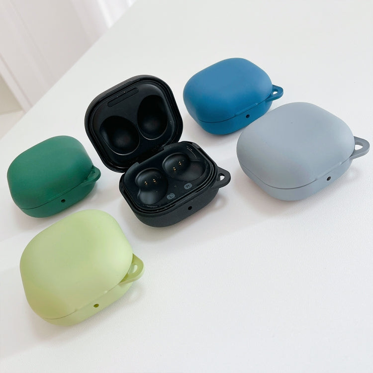 Blue, green, and light gray frosted earphone cases with hinge and loop