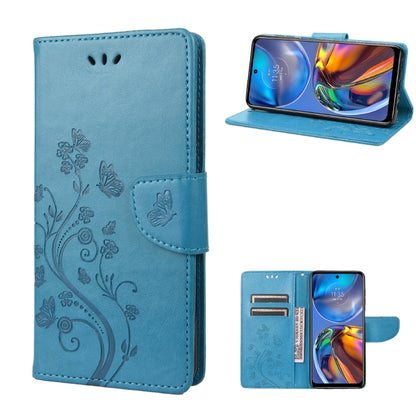 Blue leather flip phone case with butterfly-flower pattern, card slot and stand holder.
