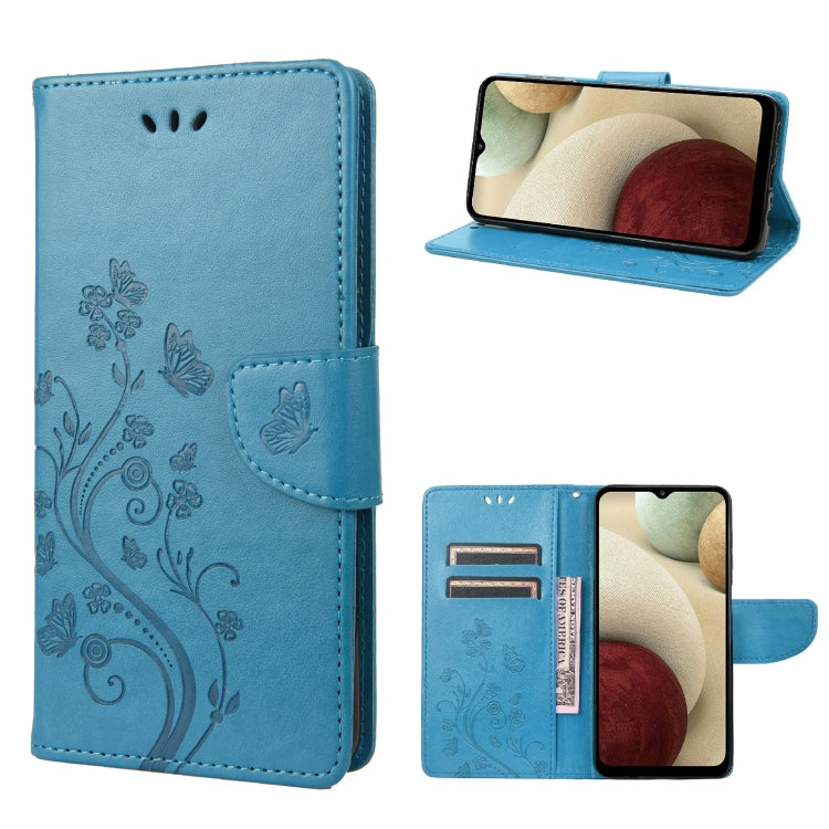 Blue leather flip phone case with butterfly floral pattern and card slot, stand view