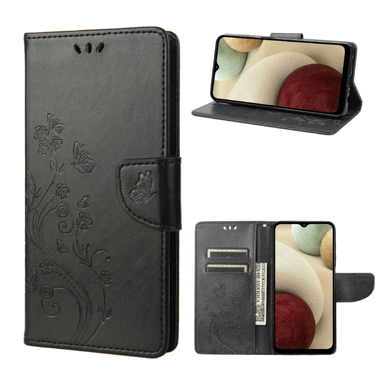 Black leather flip phone case with butterfly floral pattern and card slot, stand view