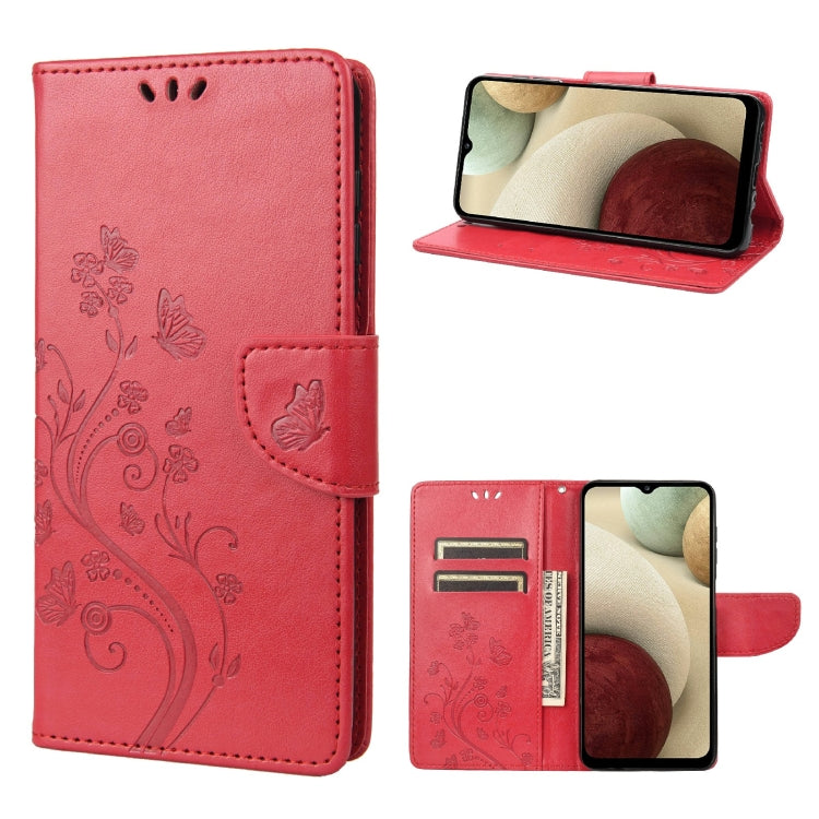 Red leather flip phone case with butterfly floral pattern and card slot, stand view