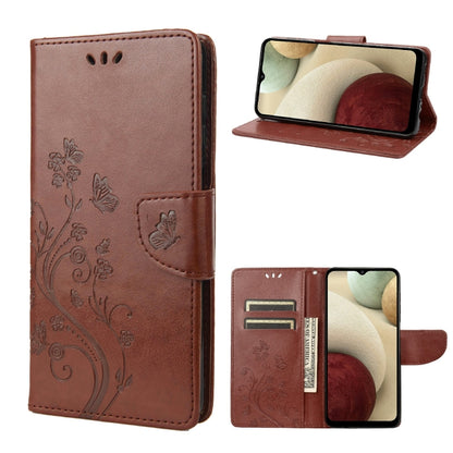 Brown leather flip phone case with butterfly floral pattern and card slot, front and stand views