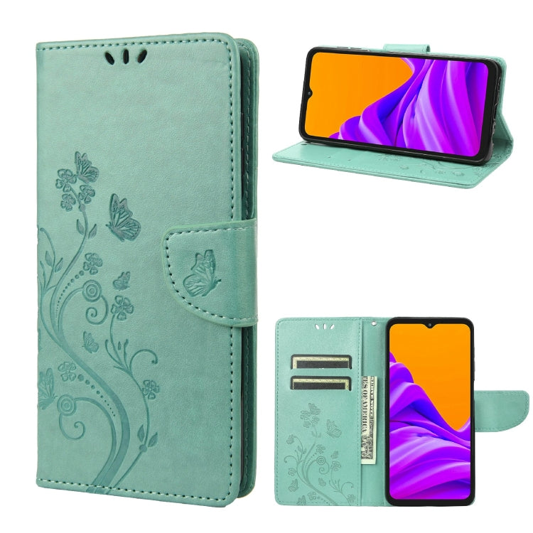 Teal leather-style phone case with butterfly floral pattern, flip cover, and card slot