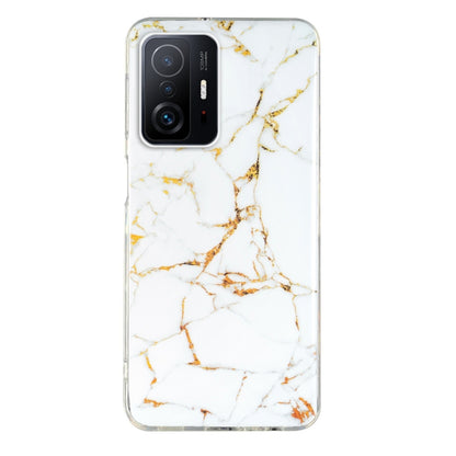 White marble TPU phone case with gold veining and covered camera cutouts