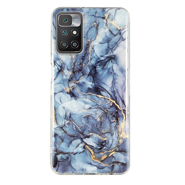 Marble pattern TPU phone case in blue with gold veining and camera cutouts