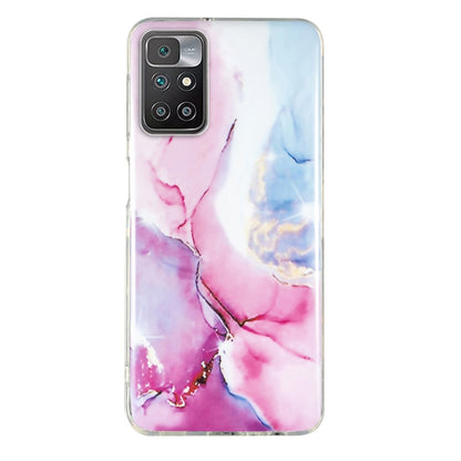 Marble pattern TPU phone case in pink and blue with gold accents and camera cutouts