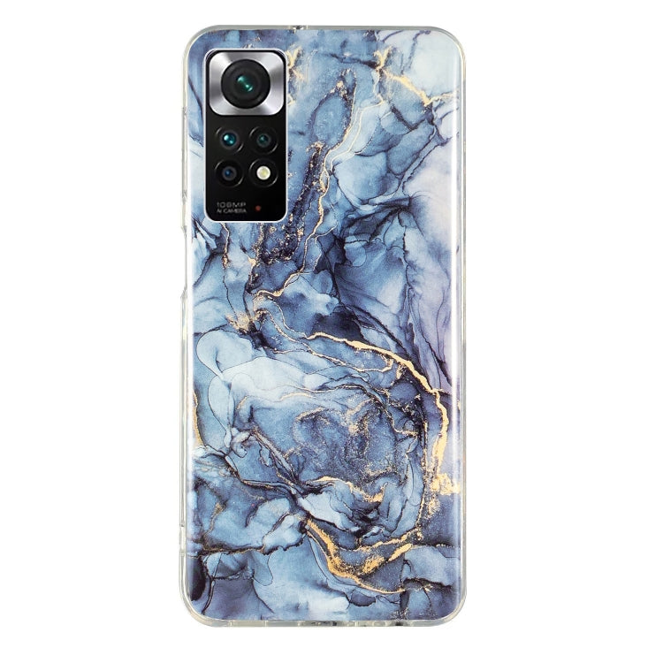 Marble pattern TPU phone case in blue marble with gold veining and camera opening