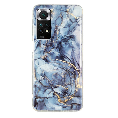 Marble pattern TPU phone case in blue marble with gold veining and camera opening