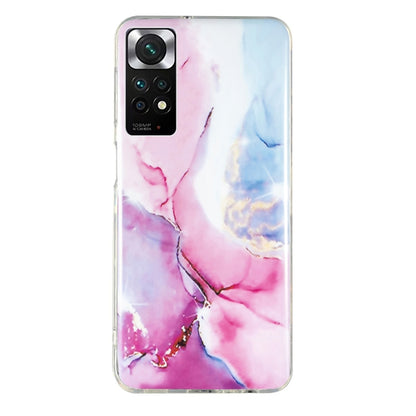 Marble pattern TPU phone case in pink and blue marble with camera opening