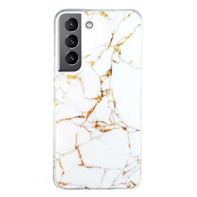 Marble pattern TPU phone case with white base and gold vein lines, clear border