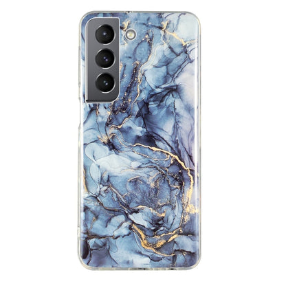 Marble pattern TPU phone case with blue marble and gold streaks, clear border