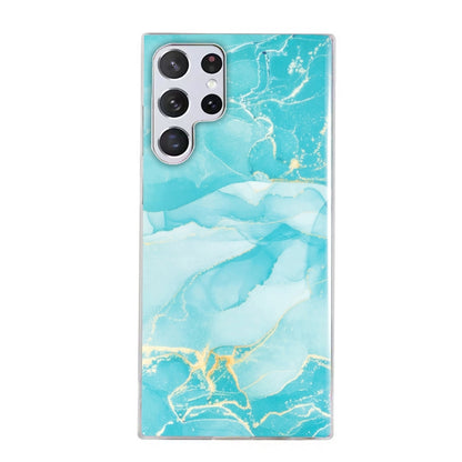 Marble pattern TPU phone case with turquoise marbling and gold vein details, cutouts