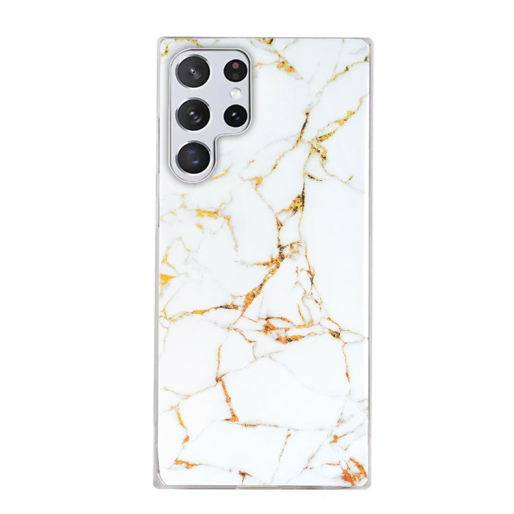 Marble pattern TPU phone case with white marble and gold branching veins, camera cutouts
