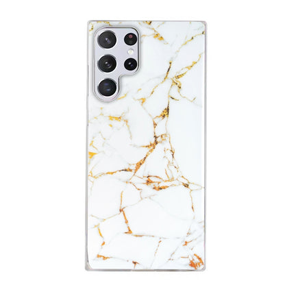 Marble pattern TPU phone case with white marble and gold branching veins, camera cutouts