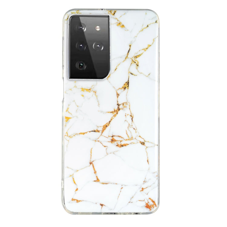 Marble pattern TPU phone case in white with gold and amber veining, clear edges