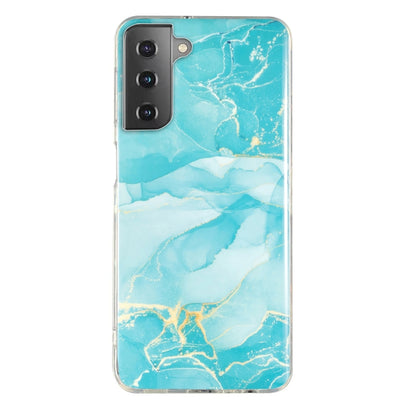 Marble pattern TPU phone case in turquoise and aqua marble, clear protective border