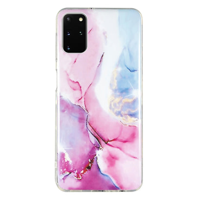 Marble-pattern TPU phone case with pink and blue marbling, clear trim
