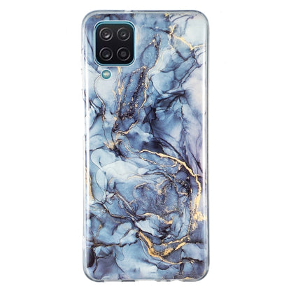 Blue marble TPU phone case with dark veins and gold accents, transparent edges.