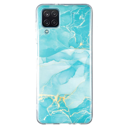 Turquoise marble TPU phone case with white waves and clear protective rim.