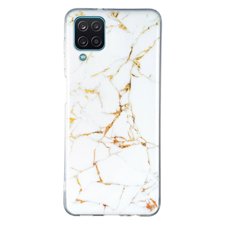 Marble pattern TPU phone case in white and gold veins, with camera cutout and button ports.