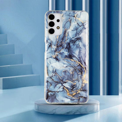Marble-pattern TPU phone case with blue marble and gold veins, camera cutouts