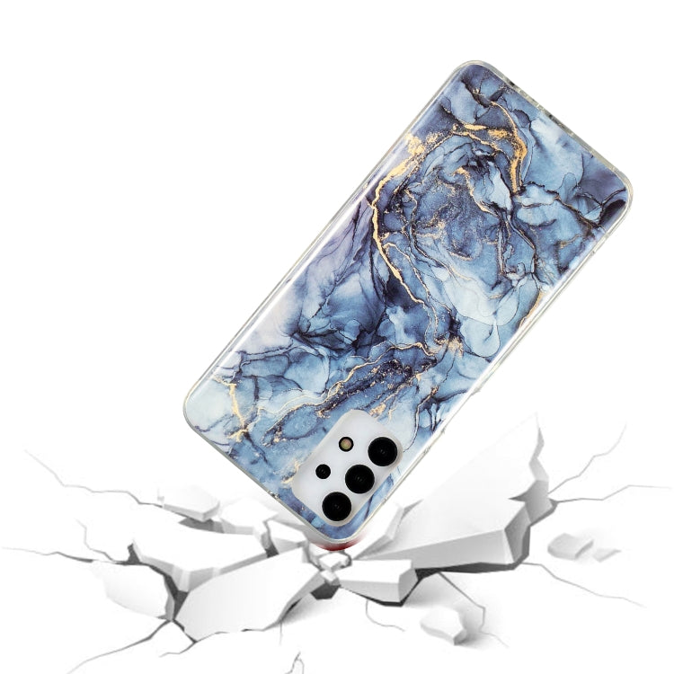 Marble-pattern TPU phone case with blue marble design, slim profile, camera cutouts