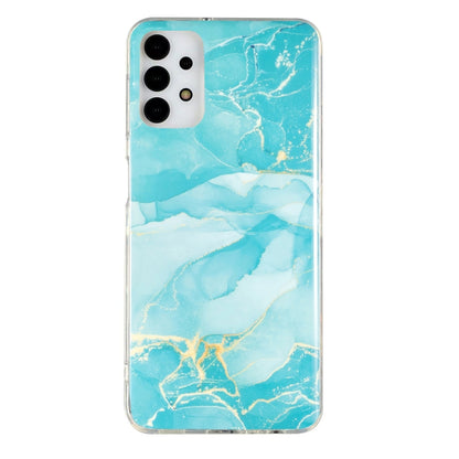 Aqua marble-pattern TPU phone case with white swirls, clear border, camera cutouts