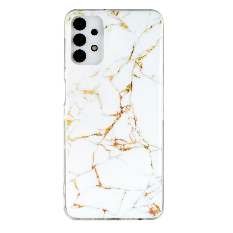 White marble-pattern TPU phone case with gold veins, clear border, camera cutouts