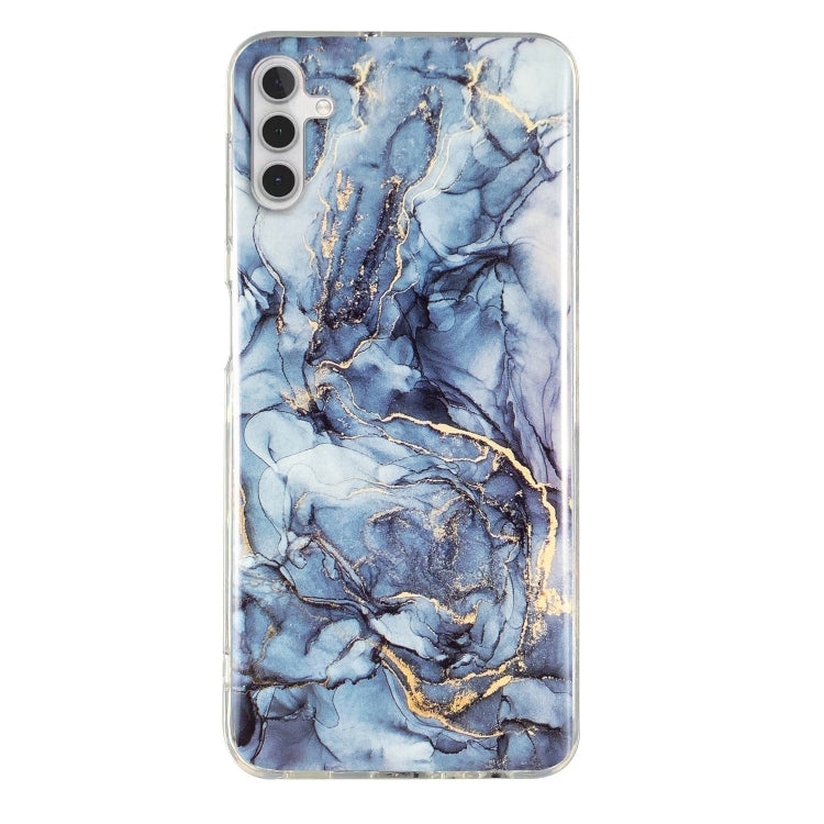 Blue marble pattern TPU phone case with clear edge and cutouts for camera and ports.