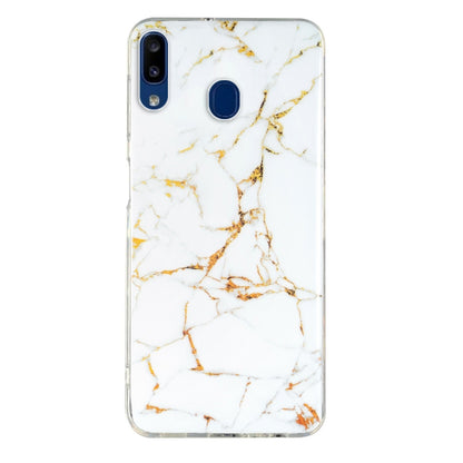 White marble TPU phone case with gold veining, clear trim, and fingerprint/side button opening.