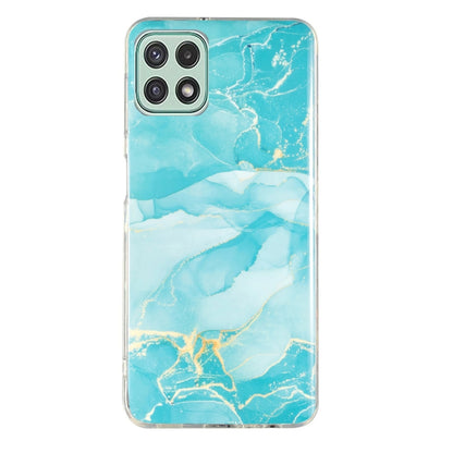 Marble-pattern TPU phone case, light blue teal marble swirls with camera cutouts