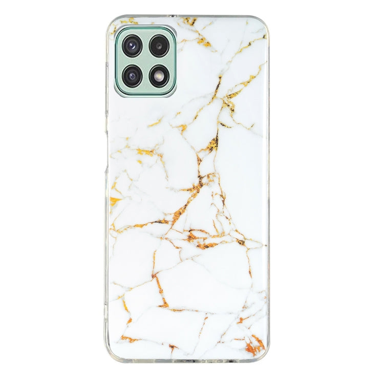 Marble-pattern TPU phone case, white with gold marble lines and camera cutouts