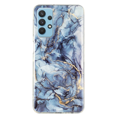 Light blue marble TPU phone case with gold flecks and clear protective edges