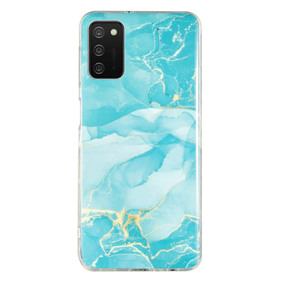 Marble-pattern TPU phone case, aqua turquoise marbling, clear edges, quad-camera cutout