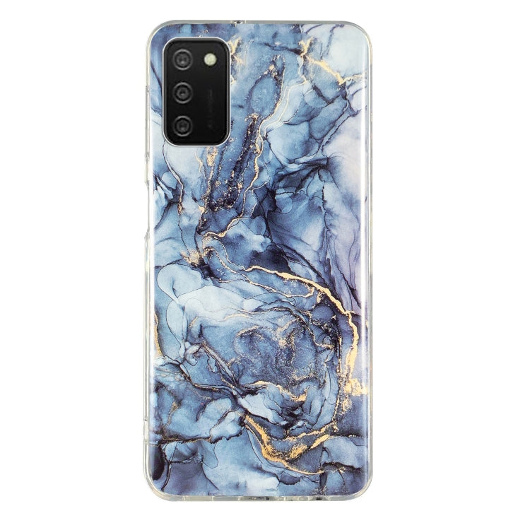 TPU phone case with blue marble pattern and gold veining, clear edges, camera cutout