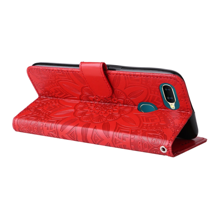 Red embossed sunflower leather folio phone case with stand mode and side camera cutout