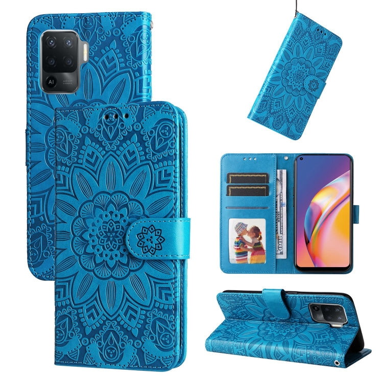 Blue embossed sunflower leather-style wallet phone case with card slots and kickstand