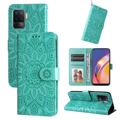 Teal embossed sunflower leather-style wallet phone case with card slots and stand