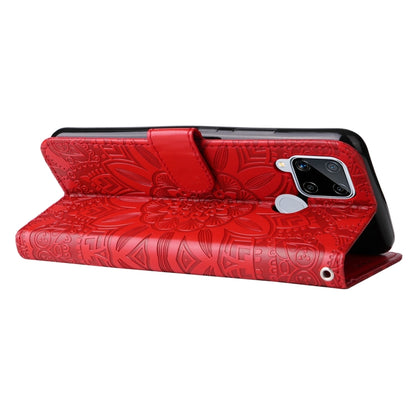 Red embossed sunflower leather flip phone case with textured pattern