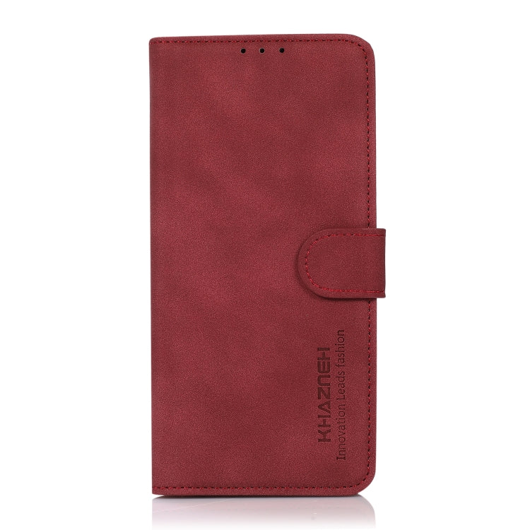 Red matte leather folio phone case with side closure and embossed branding