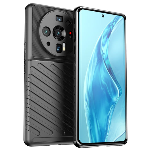 Black shockproof TPU phone case with camera cutouts and textured grip