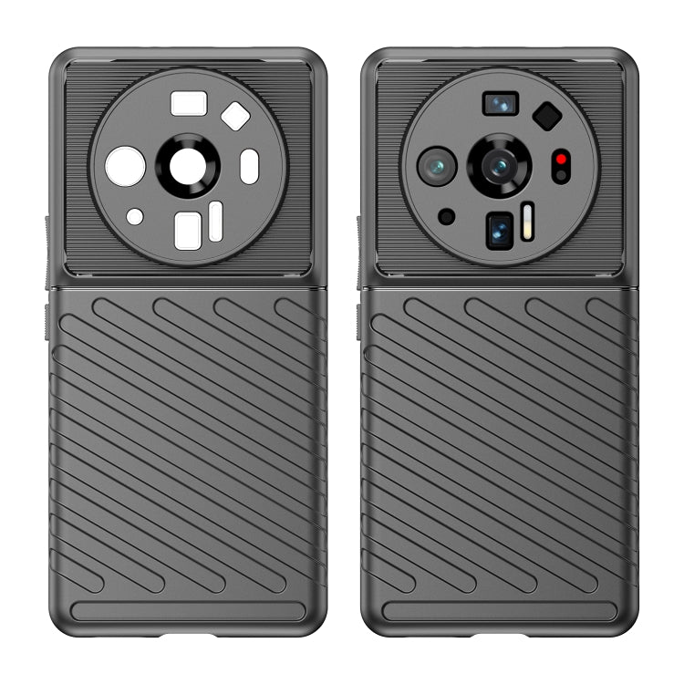 Black TPU phone case two views, textured back and camera lens openings