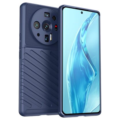 Blue shockproof TPU phone case with textured back and camera cutouts