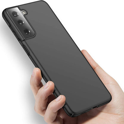 Black slim phone case held in hand, with camera and button cutouts